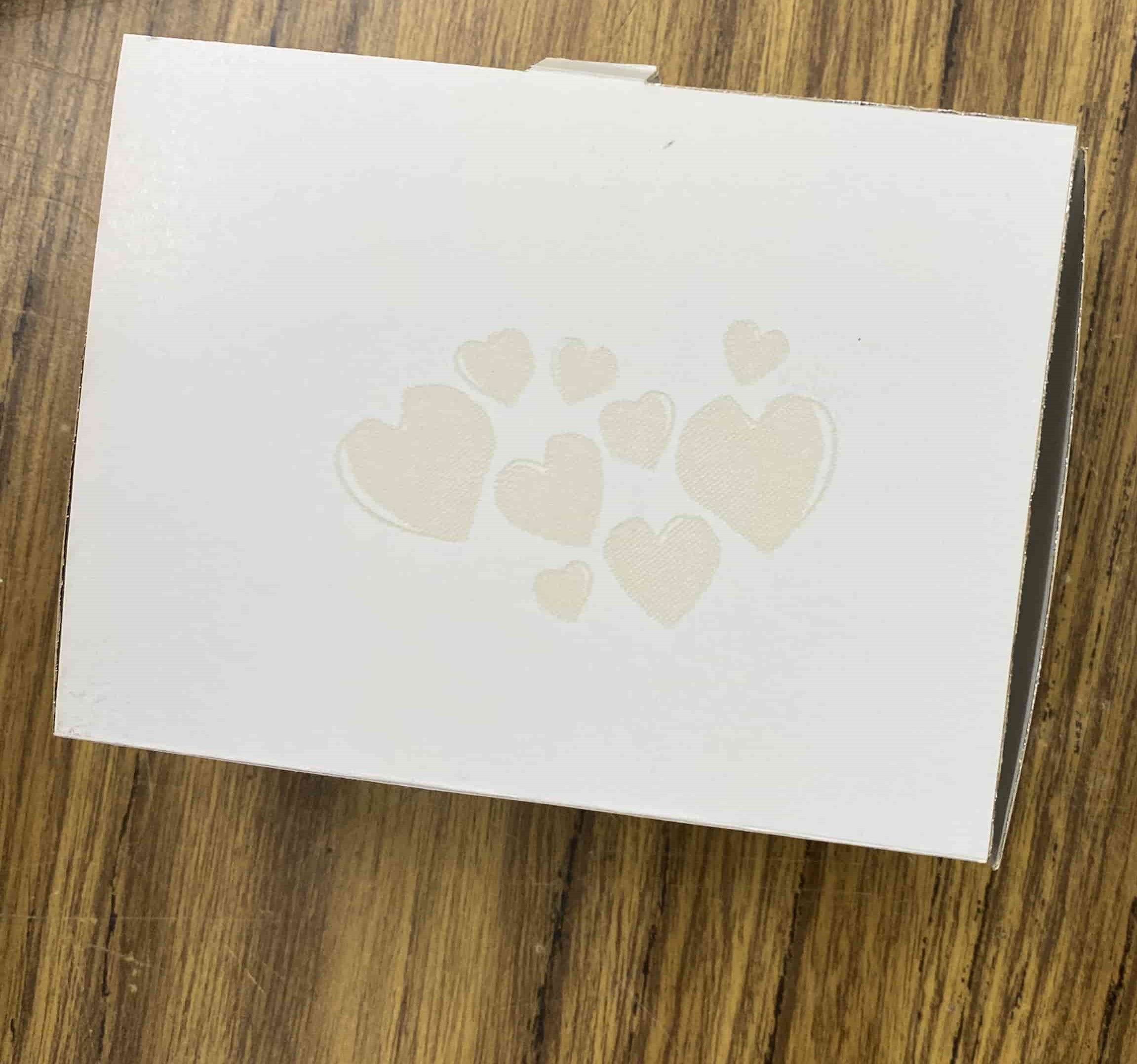 Completed box with hearts engraving, top view 