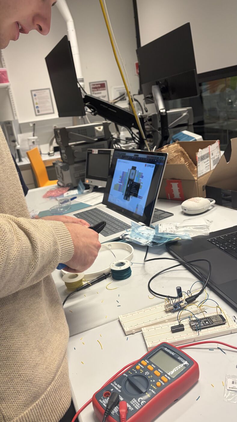 Breadboard bring-up: probing, checking the DevKit pinout, and the full breadboard prototype