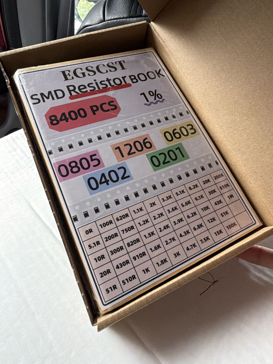 The SMD resistor book (no 33 Ω) and the lab's diode drawer, where D2's substitute came from